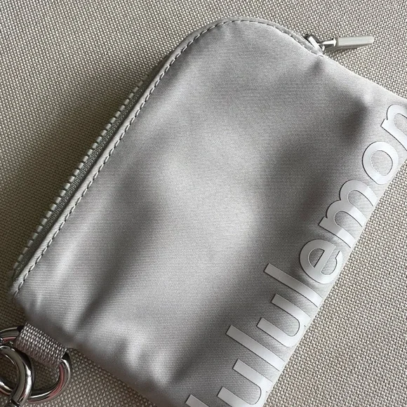 Lululemon Beige Wristlet Pouch + Never Lost Keychain Strap - Picture 3 of 12
